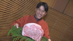 大山黒牛（ブロック）持つ三浦さん